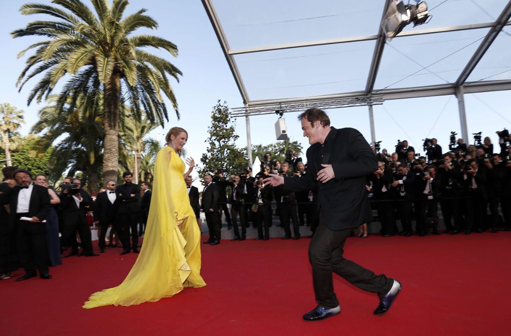 Uma Thurman und Quentin Tarantino tanzen 2014 auf dem Roten Teppich in Cannes.