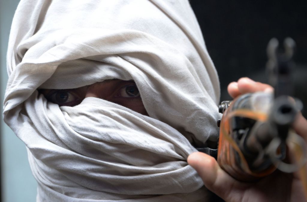 Das radikale Gesicht von Religion: Vermummter Taliban-Anhänger. Foto: AFP