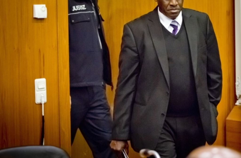 Ein Archivbild zeigt den angeklagten, früheren Bürgermeister aus Ruanda im Februar 2014 im Oberlandesgericht Frankfurt am Main. Foto: dpa