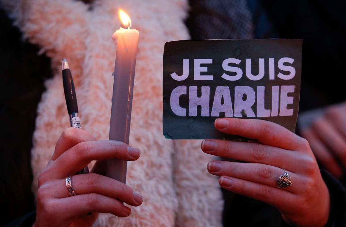 Religiöser Fanatismus  führte    zu dem Anschlag   auf die Redaktion  des Satire-Magazins Charlie Hebdo in Paris. Foto: dpa/Julien Warnand