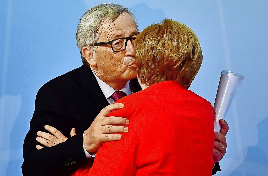 Merkel begrüßt EU-Kommissionspräsident Juncker...