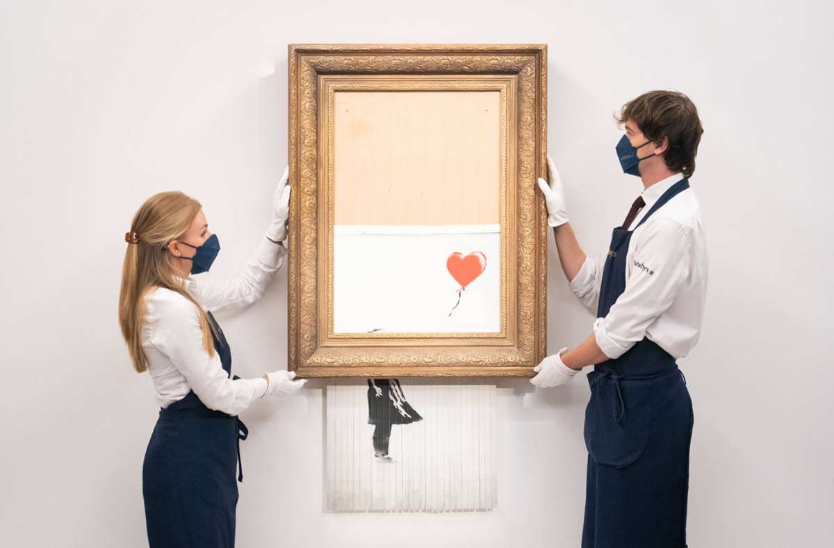 Das Banksy-Werk „Love is in the Bin“  wurde für 16 Millionen Pfund versteigert. Foto: imago images/ZUMA Press/Dominic Lipinski via www.imago-images.de