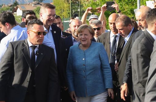 Angela Merkel kommt ins Trainingslager der Deutschen Nationalmannschaft in Eppan. Foto: Bongarts