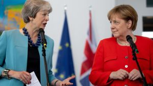 May trifft sich mit Merkel und Rutte