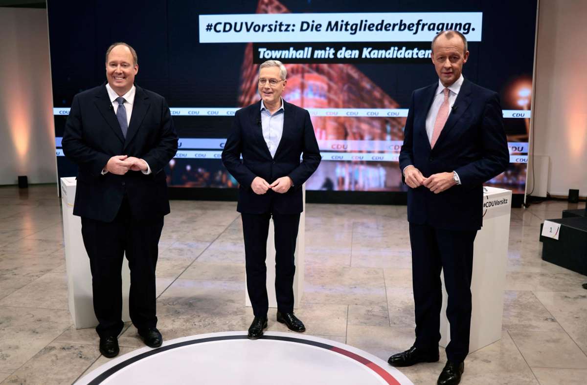 Helge Braun , Norbert Roettgen und Friedrich Merz (v.l.) Foto: AFP/HANNIBAL HANSCHKE