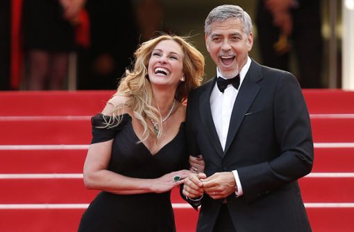 Julia Roberts und George Clooney werden in der romantischen Komödie „Ticket To Paradise“ zu sehen sein. (Archivbild) Foto: dpa/Ian Langsdon