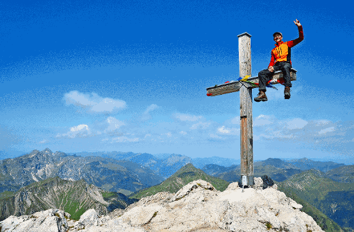 Glück des Gipfelstürmers: Endlich oben! Foto: Andreas P./Fotolia