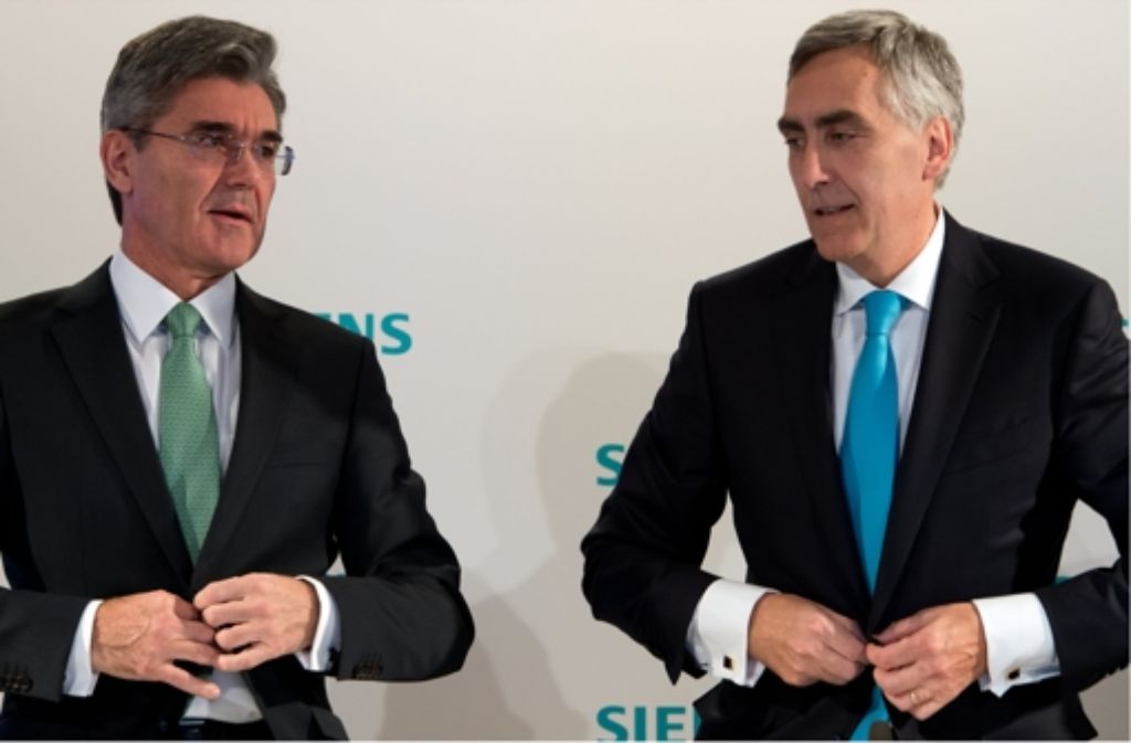 Der neue und der alte Siemens-Chef: Joe Kaeser (li.) und Peter Löscher. Foto: dpa