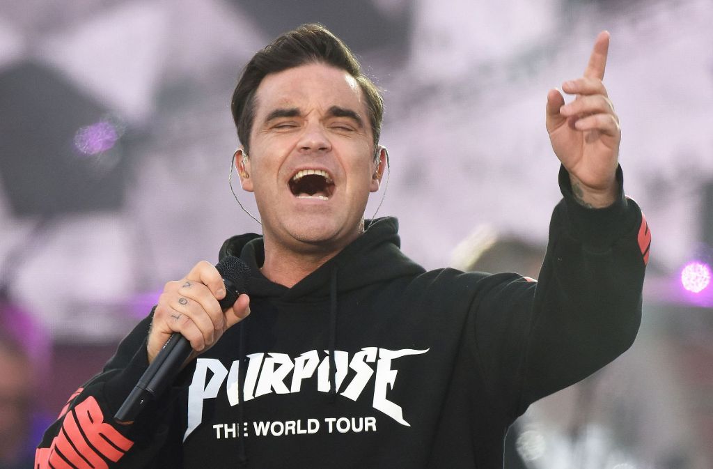 Robbie Williams singt beim Benefizkonzert „One Love Manchester“.,