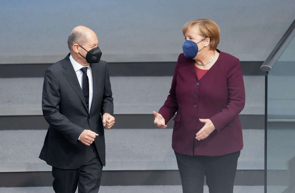 Angela Merkel und Olaf Scholz sehen die Entwicklung mit Sorge. Foto: dpa/Kay Nietfeld