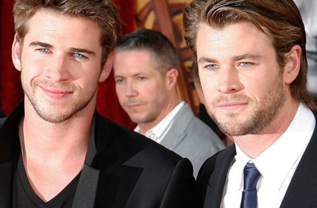 Der Schauspieler Liam Hemsworth (links) ist vor allem als Ex-Dauerverlobter von Teeniestar Miley Cyrus bekannt geworden. Im Filmbusiness ist auch sein großer Bruder Chris, seines Zeichens amtierender "Sexiest Man Alive".