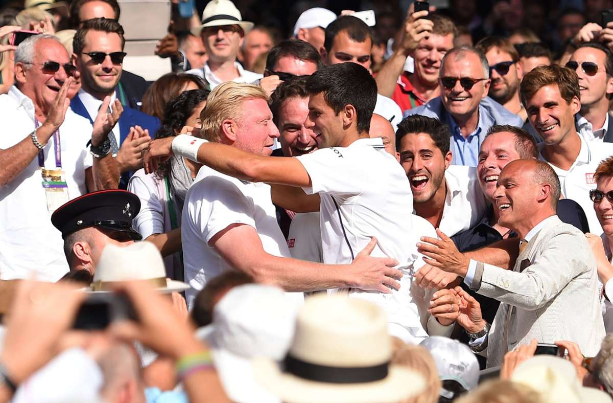 Djokovic holt 2014 überraschend Boris Becker als neuen Trainer – und feiert mit der deutschen Tennislegende große Erfolge: hier den Wimbledonsieg 2014 in der Box.