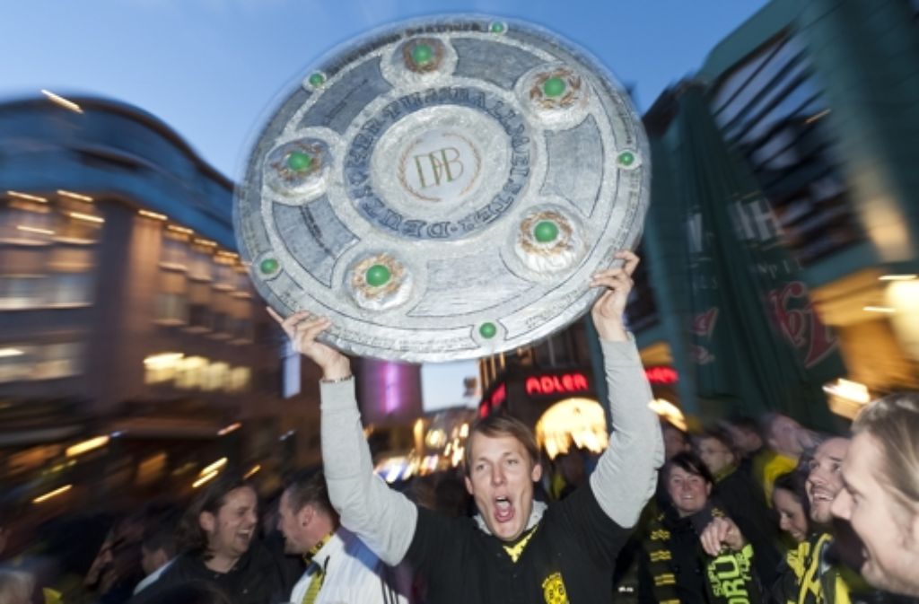 Ganz Dortmund scheint  auf den Beinen zu sein, um den Titel zu feiern. Foto: dpa